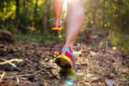 A person running through a forest