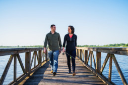 Couple walking on bridge