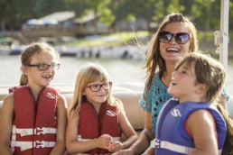 Family enjoying their time on a boat